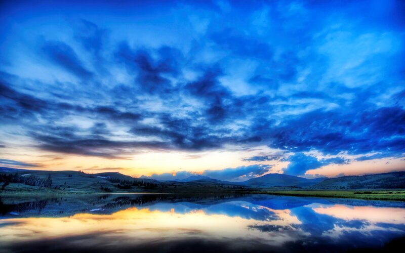Blue sky over a calm lake