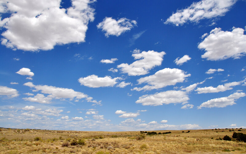 Blue sky over arid landscape
