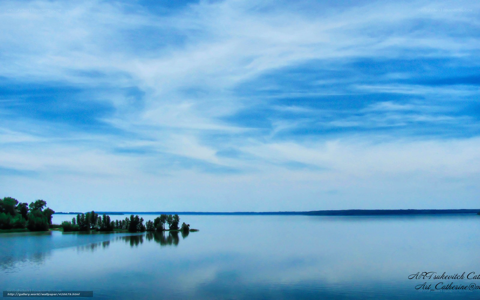 Blue sky over calm lake