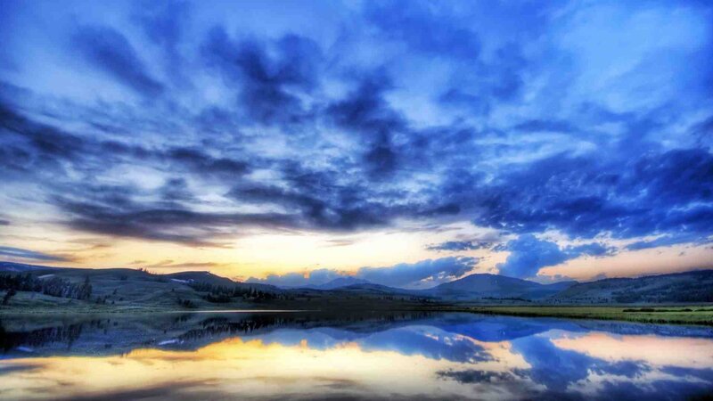 Blue sky over calm lake