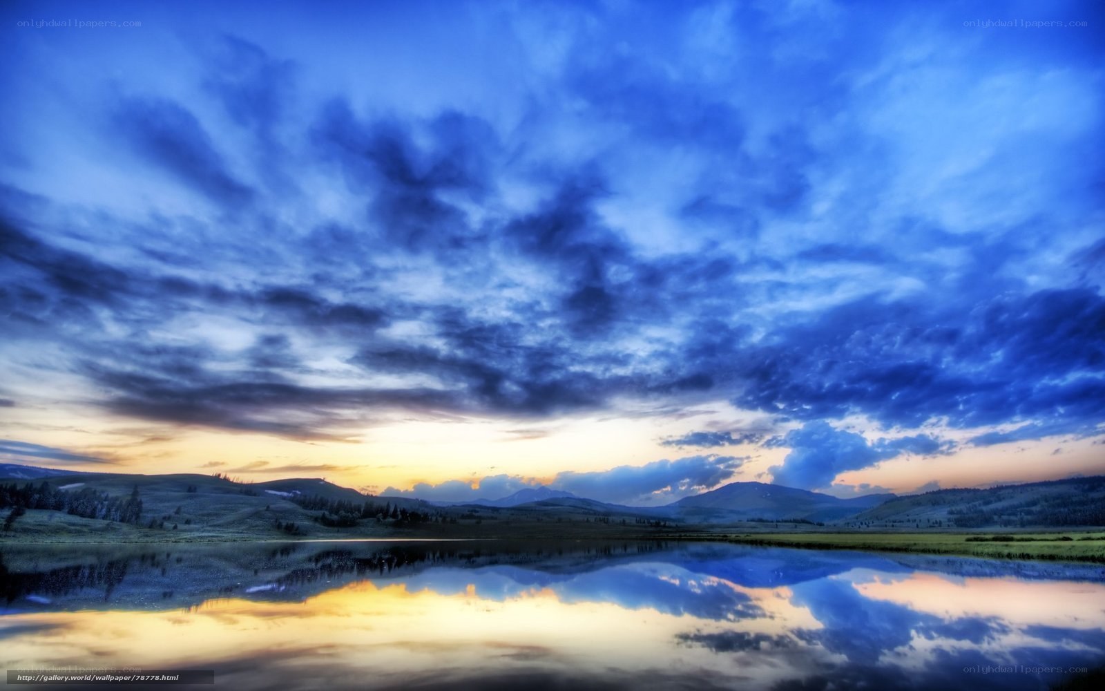 Blue sky over calm lake