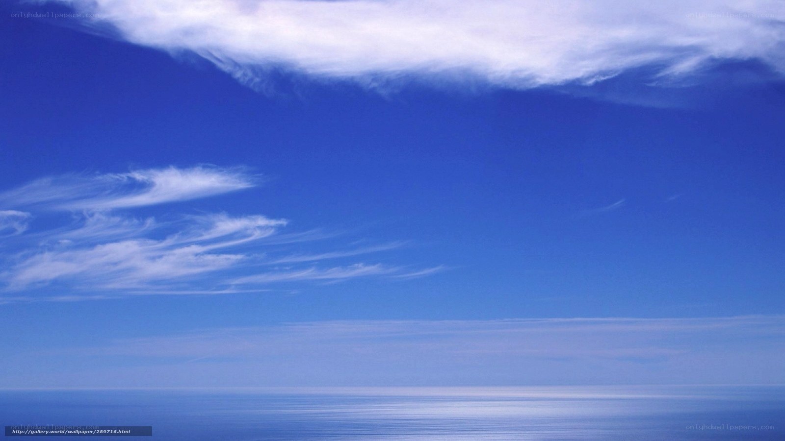Blue sky over calm ocean