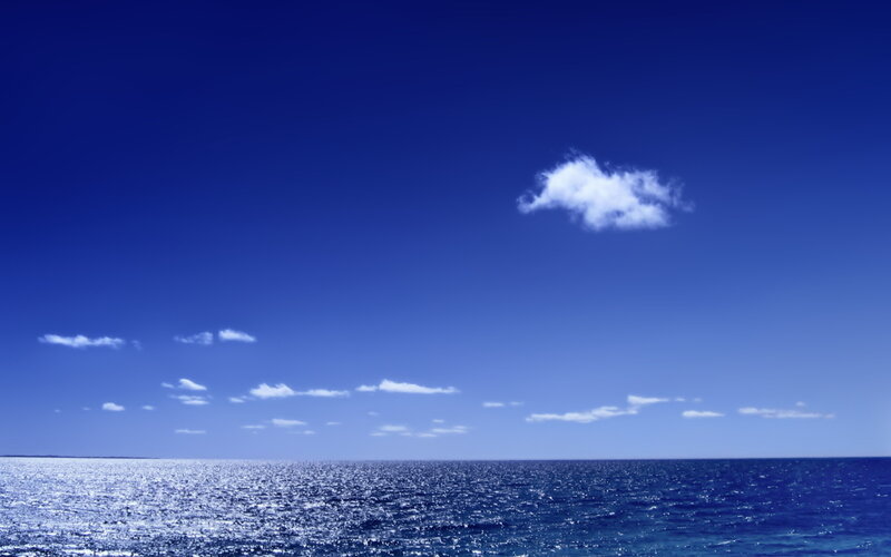 Blue sky over calm ocean