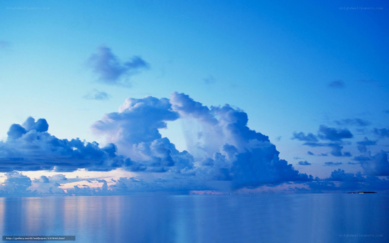 Blue sky over calm ocean