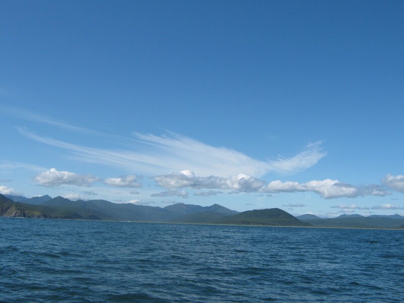 Blue sky over mountain lake