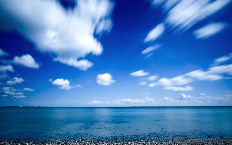 Blue Sky over Ocean — Serene