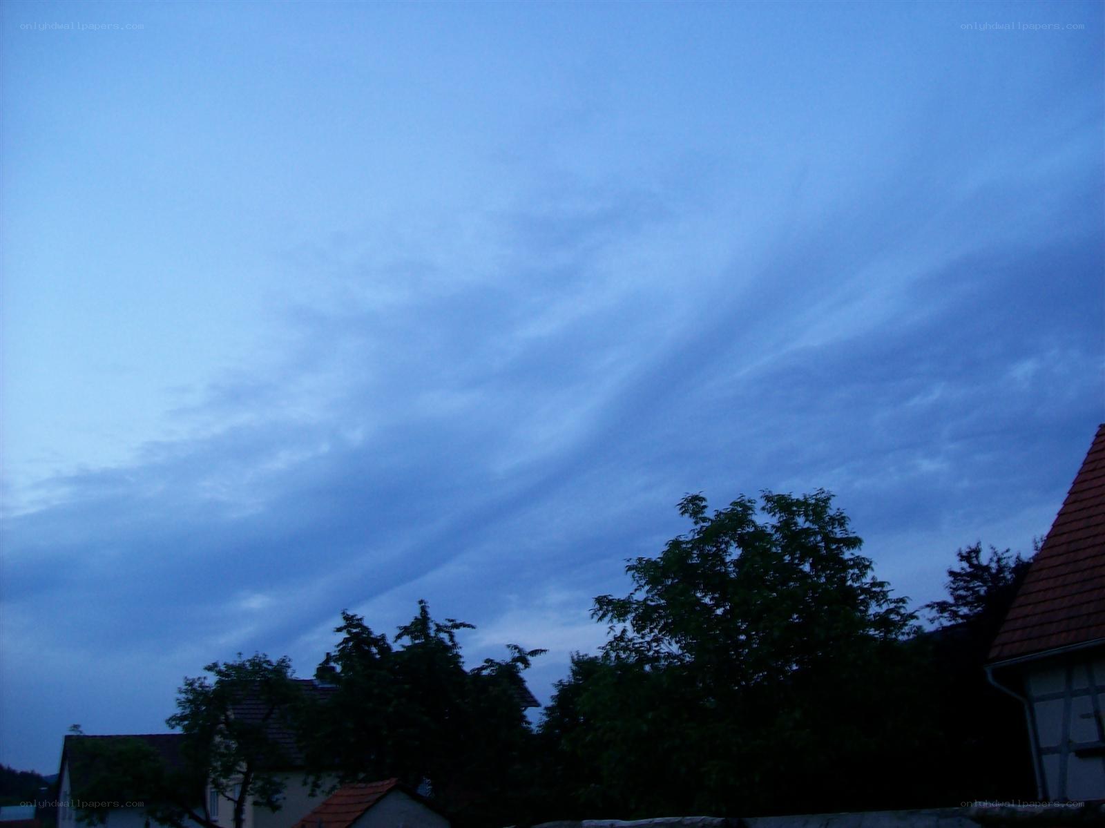 Blue sky with clouds at dusk