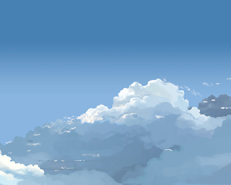 Blue sky with fluffy clouds