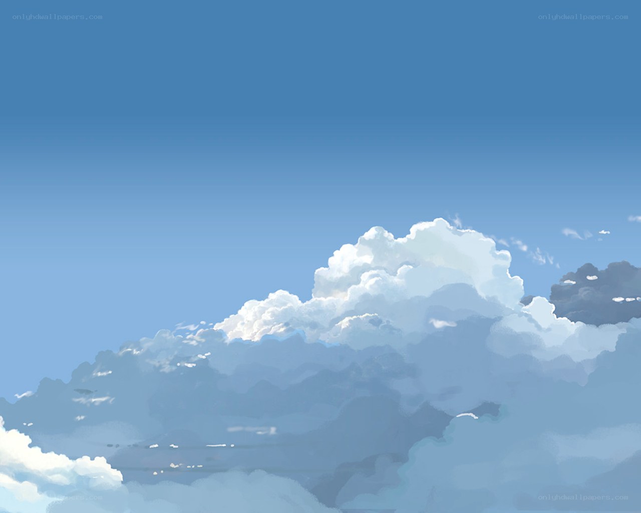 Blue sky with fluffy clouds