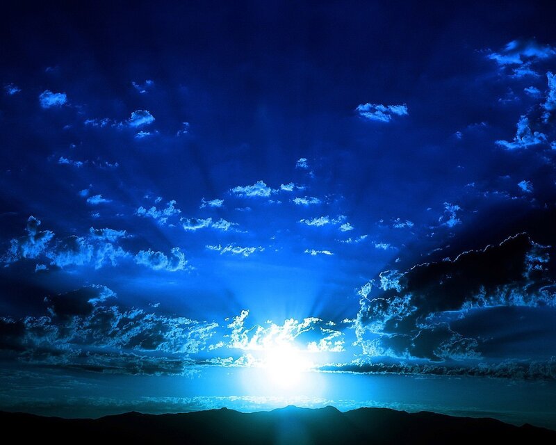 Blue sky with sun rays