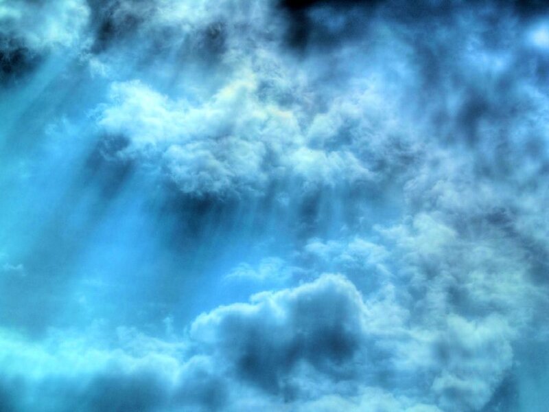 Blue sky with sunbeams