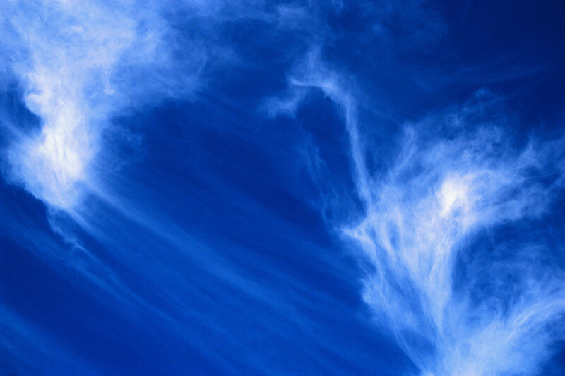Blue sky with wispy clouds