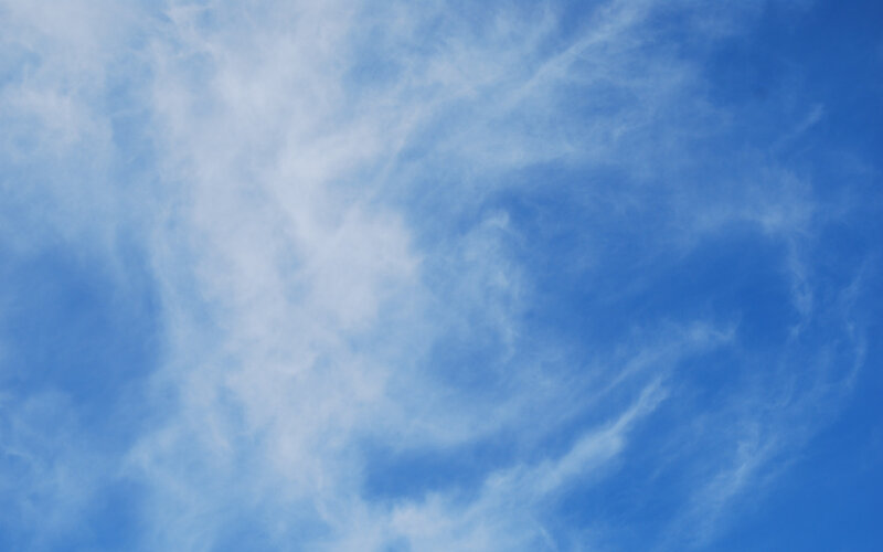 blue sky with wispy clouds