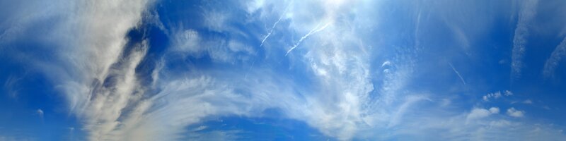 Blue sky with wispy clouds