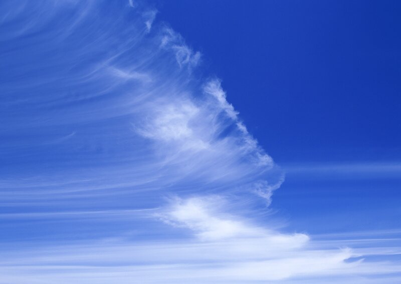Blue sky with wispy clouds
