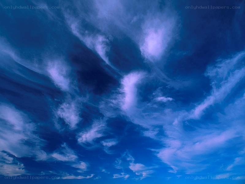 Blue sky with wispy clouds