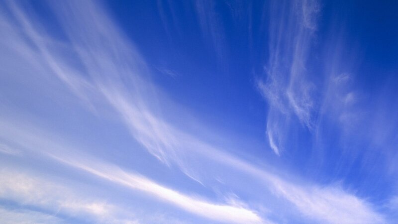 blue sky with wispy clouds
