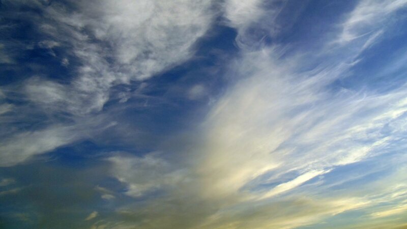 Blue sky with wispy clouds