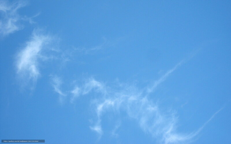 Blue sky with wispy clouds