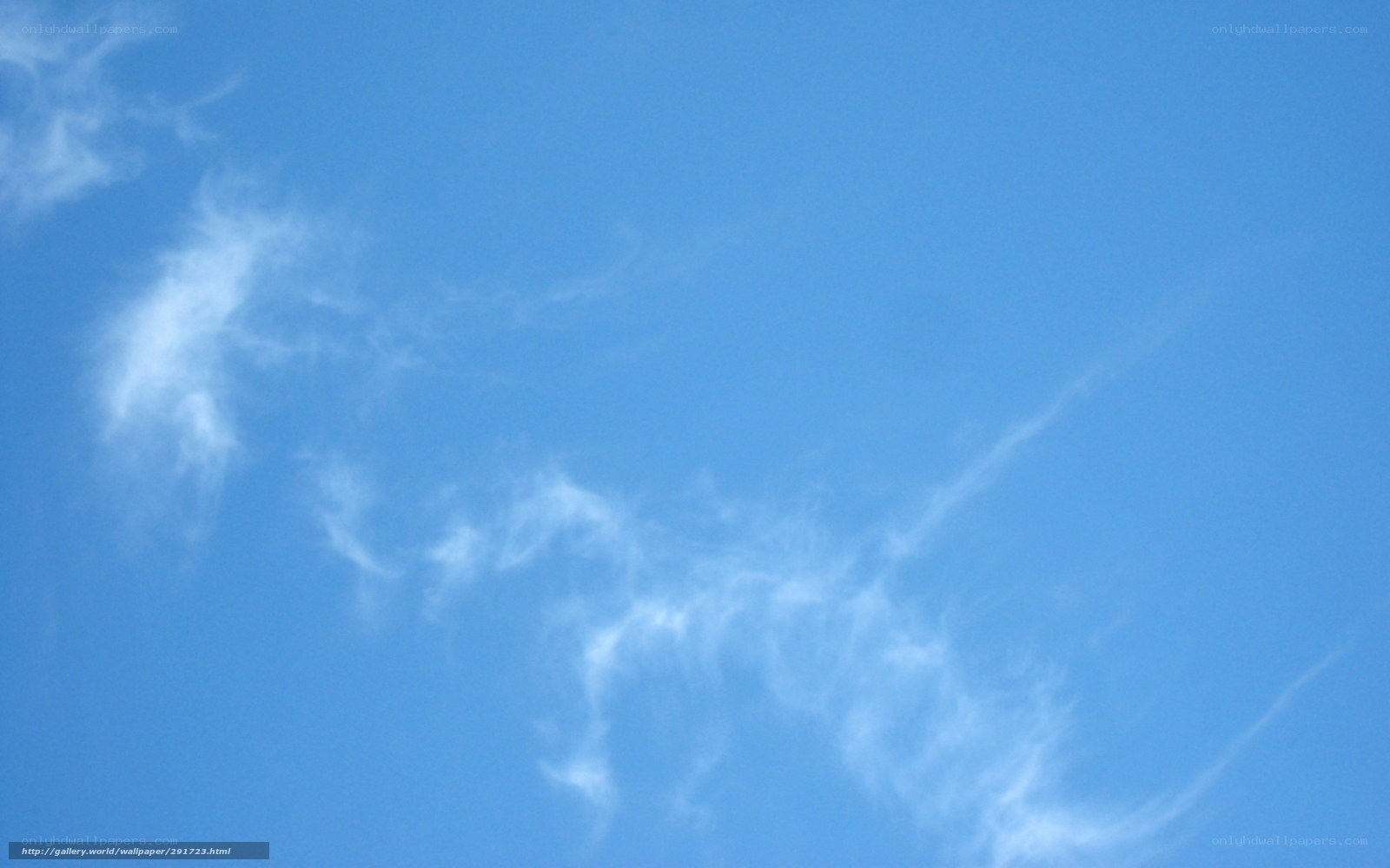 Blue sky with wispy clouds
