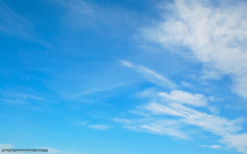 Blue sky with wispy clouds