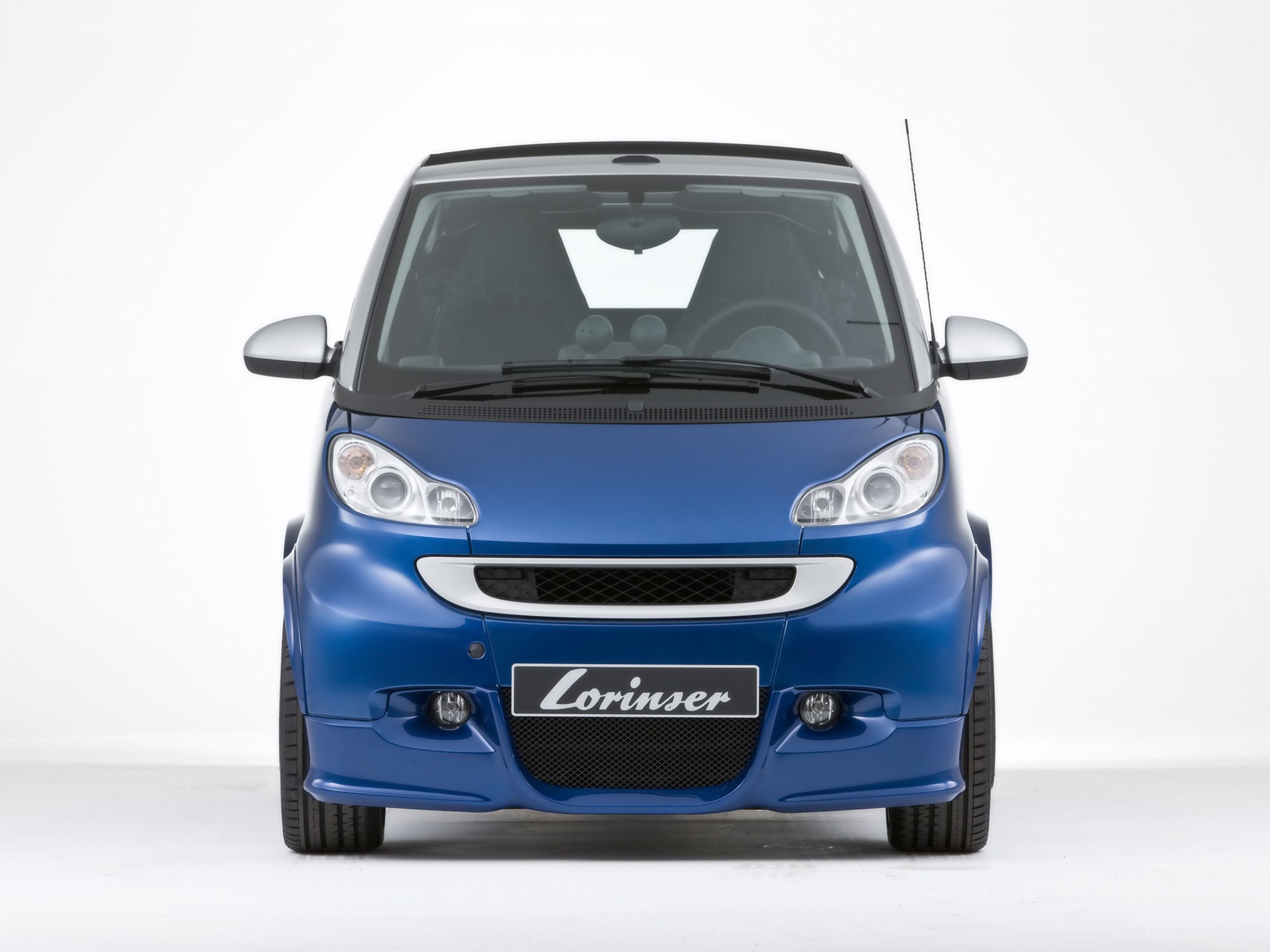 Blue smart car front view