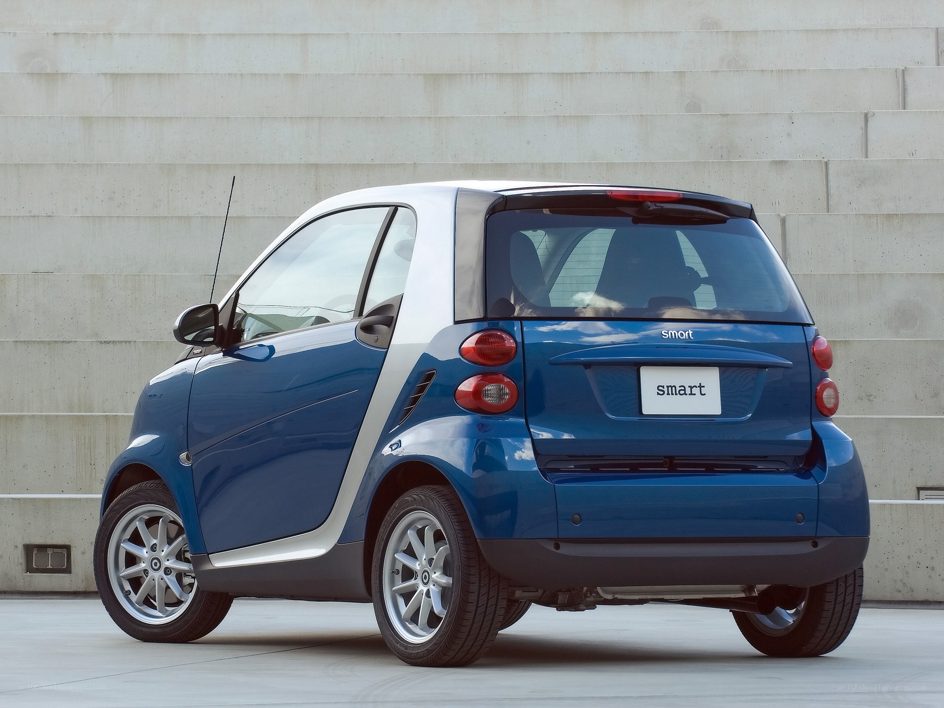 Blue smart car rear view