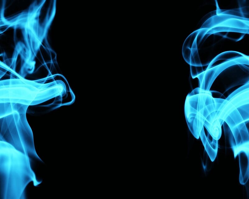 blue smoke swirls on black