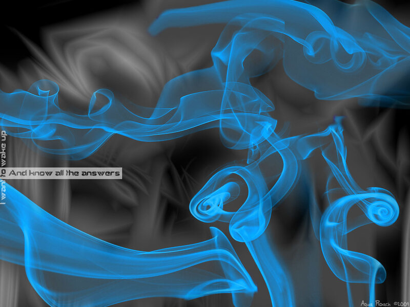 Blue smoke swirls on dark background