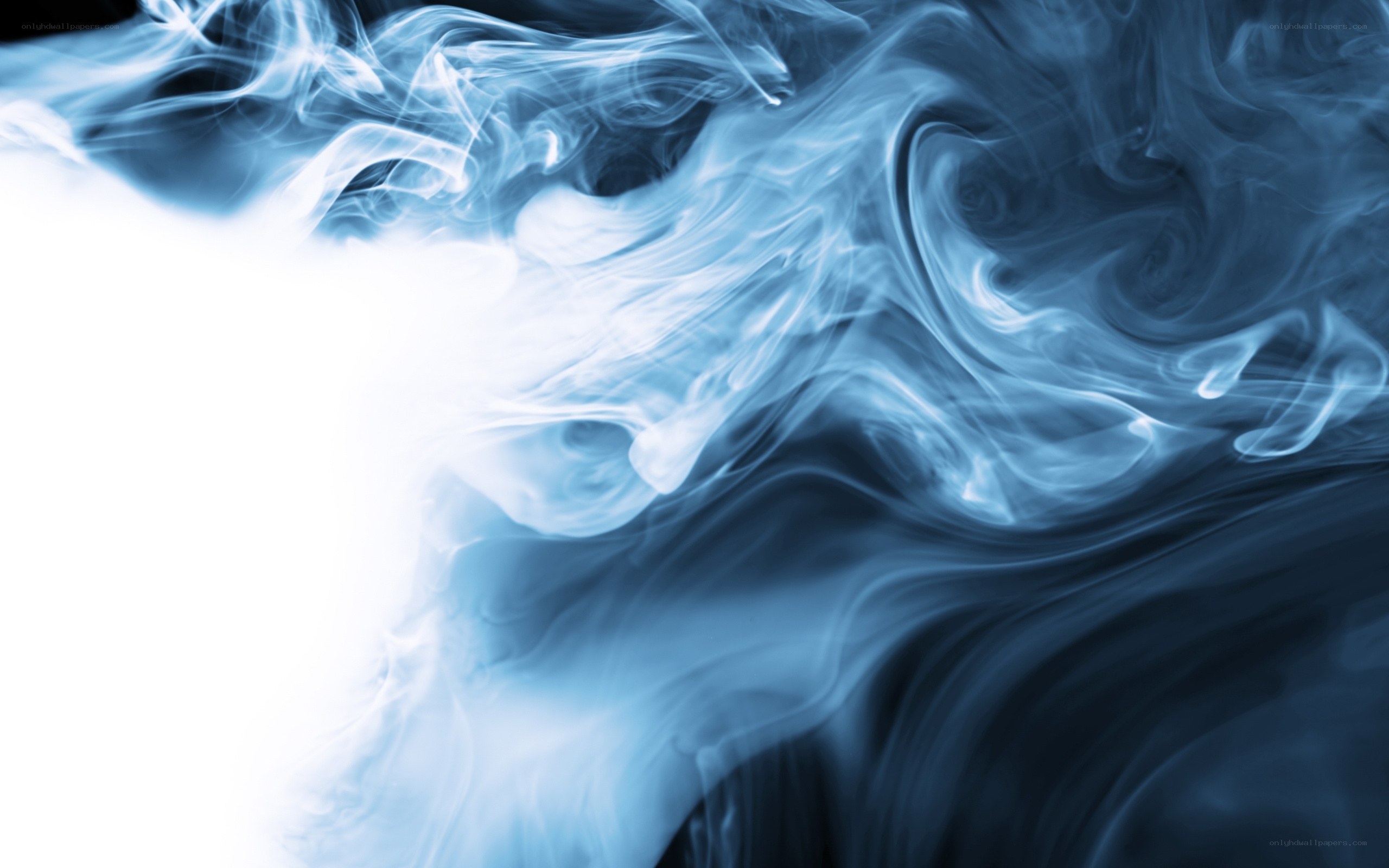 Blue smoke swirls