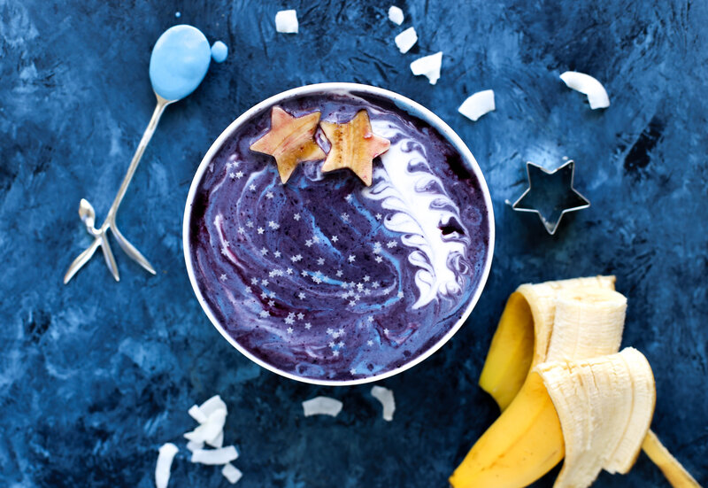 blue smoothie bowl with stars