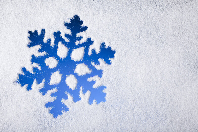 Blue Snowflake in Snow