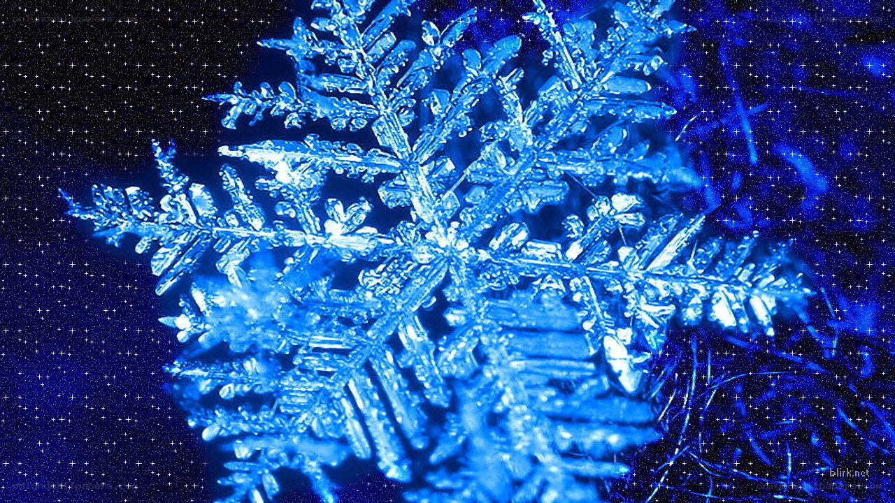 Blue snowflake on starry background