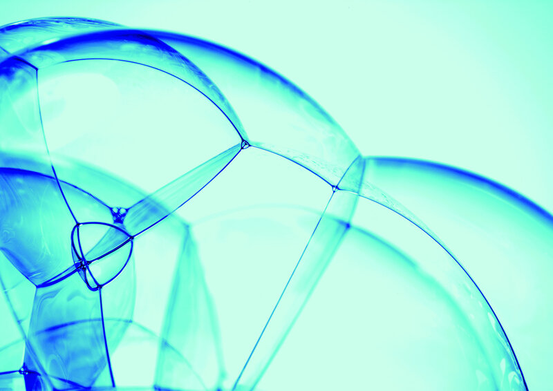 Blue soap bubbles close-up