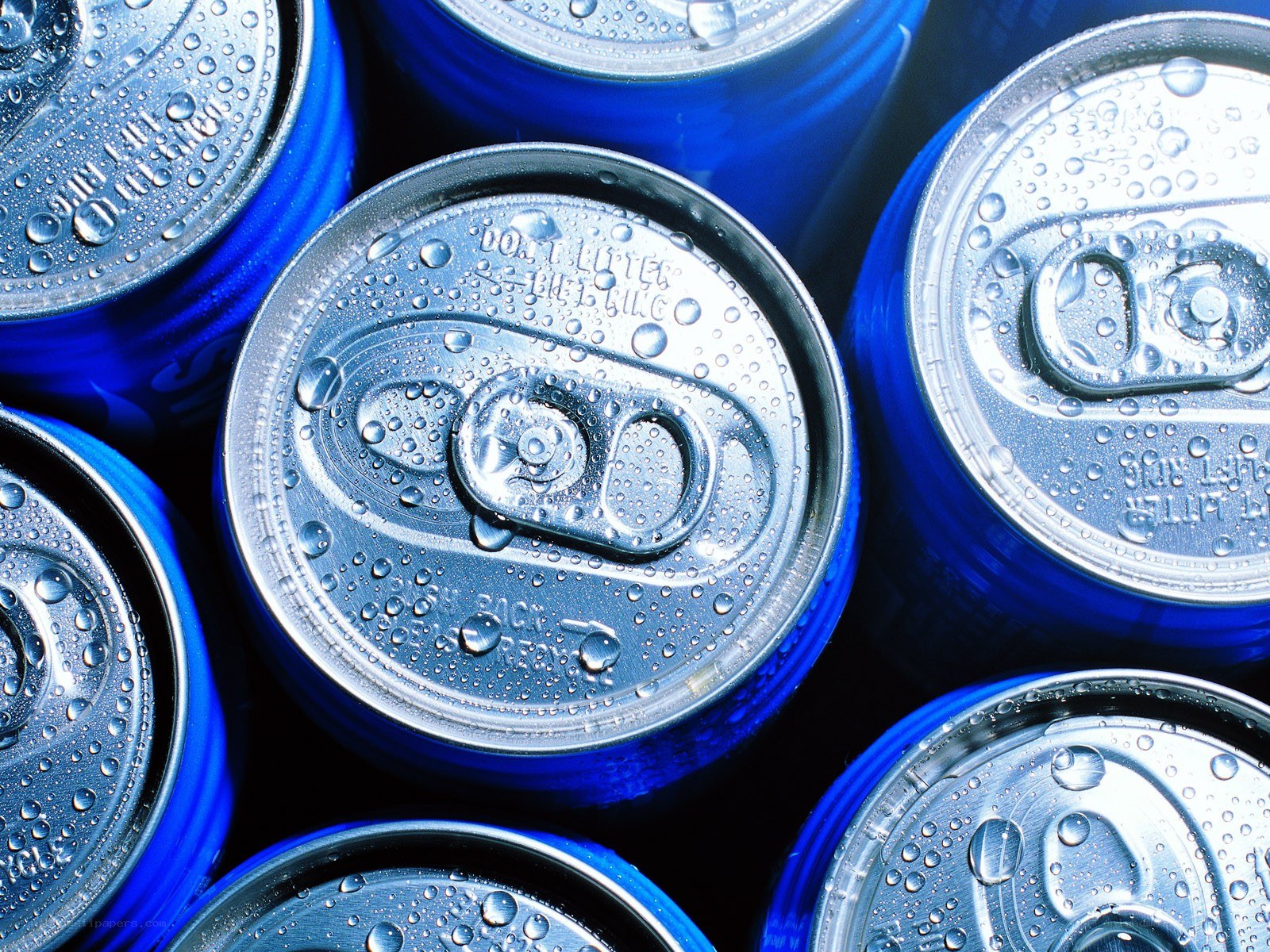 blue soda cans with condensation