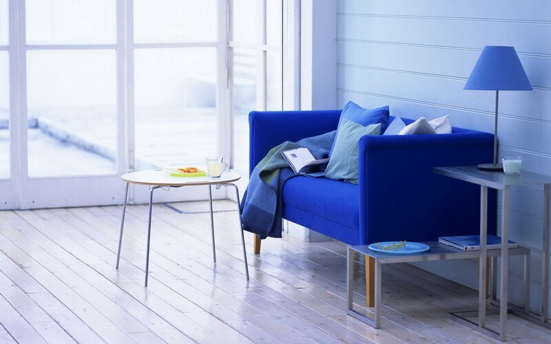 Blue sofa in bright living room