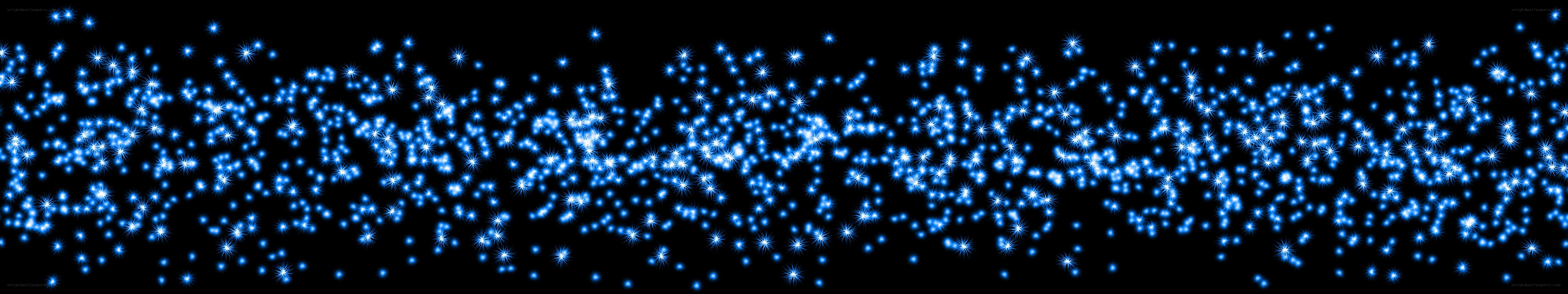 blue sparkles on black background