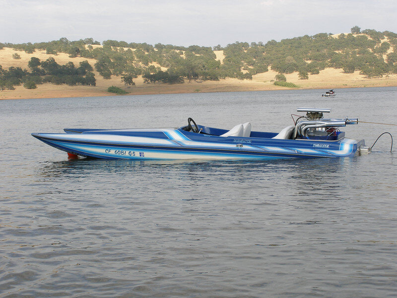 Blue Speedboat on Water