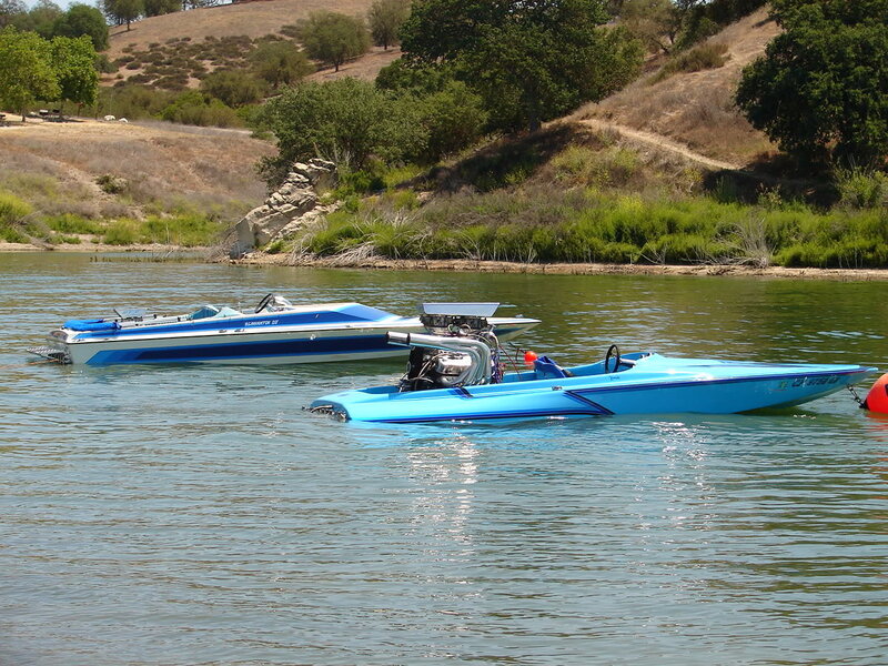 Blue Speedboats on Water