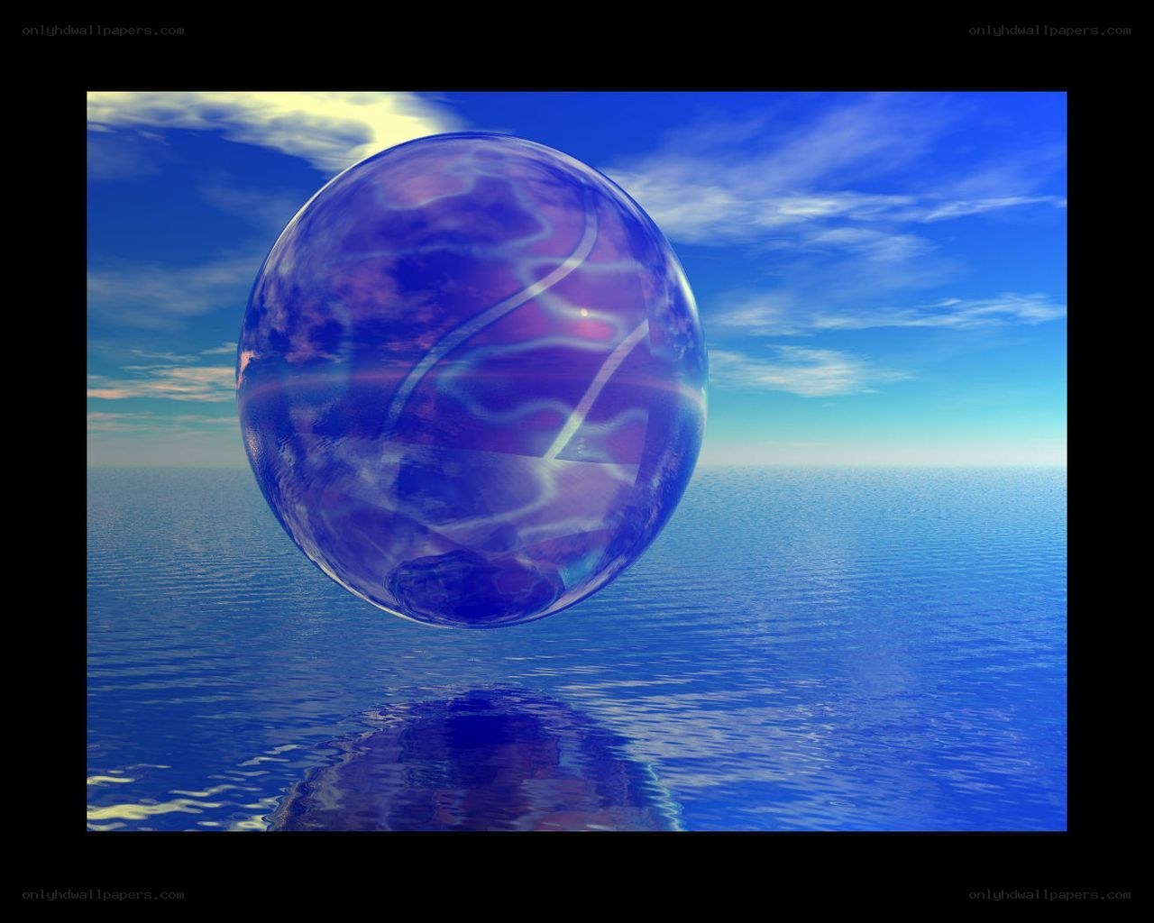 Blue sphere over ocean