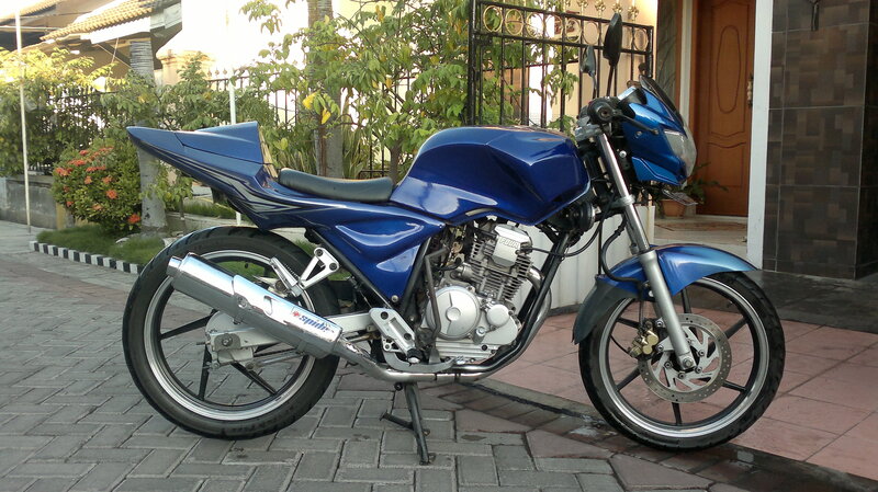 Blue Sport Motorcycle — Calm, Afternoon, Photograph, House