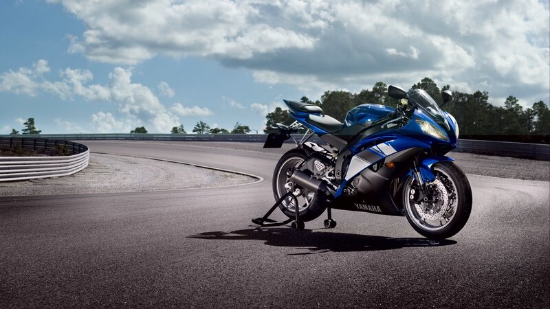 Blue Sport Motorcycle — Dramatic, Afternoon, Photograph, Racetrack, Clouds