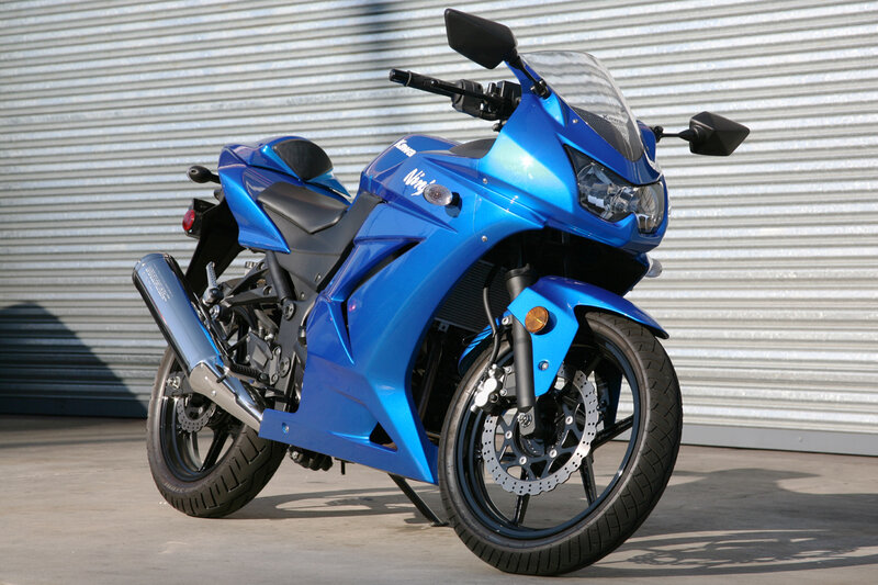 Blue Sport Motorcycle — Neutral, Afternoon, Photograph, Metal Wall