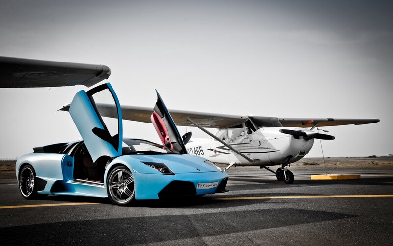 Blue Sports Car and Plane