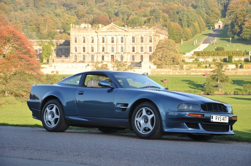 Blue sports car at a stately home