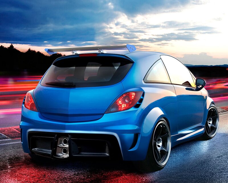 blue sports car at dusk