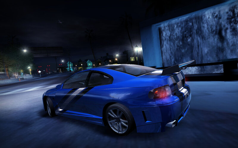 blue sports car at night