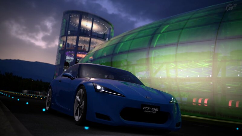 Blue sports car at night