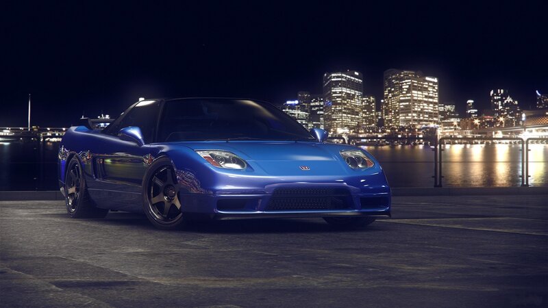 Blue sports car at night