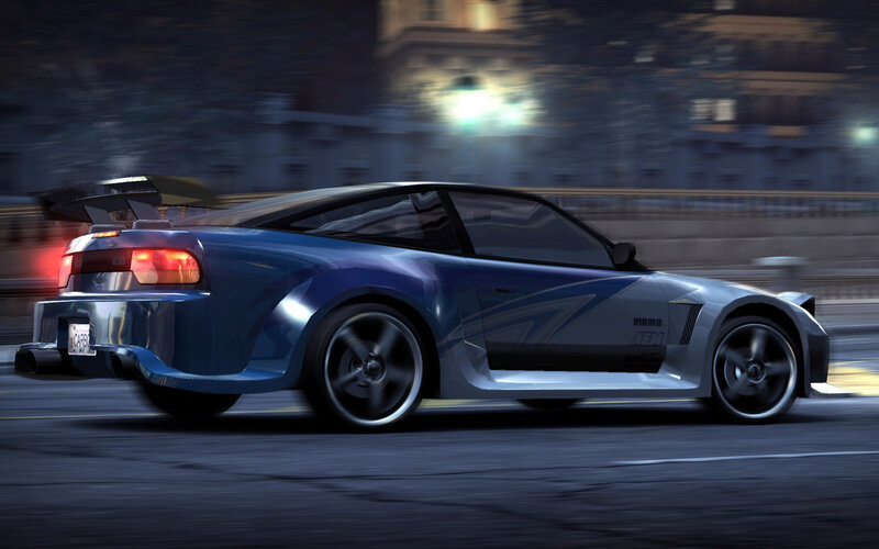 blue sports car at night